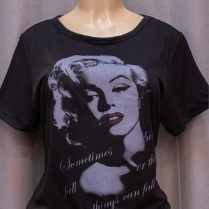 Lovely black Marilynn Monroe Tee.Nice for a date or sporting event.Cute Casual